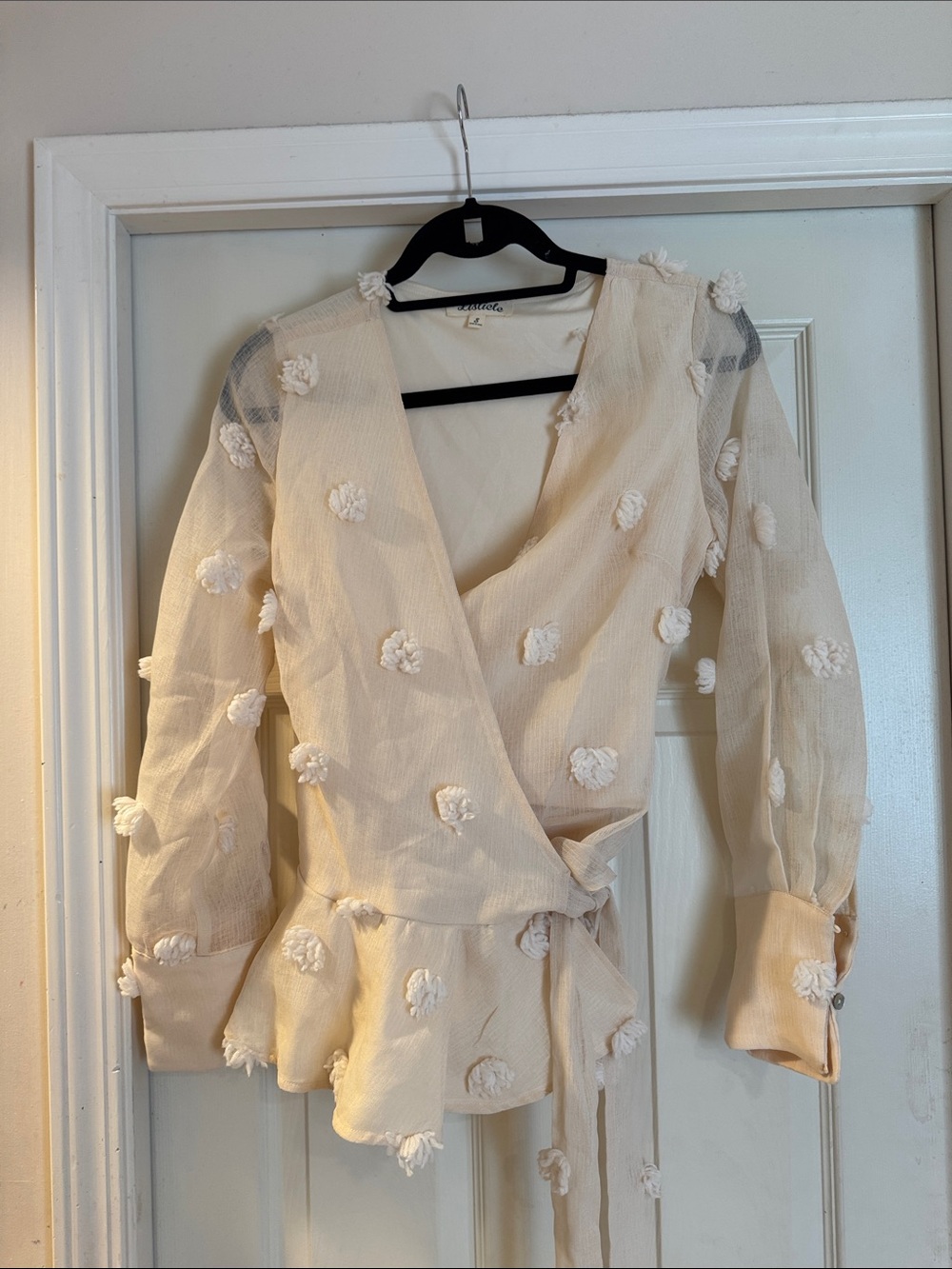 Ivory Wrap Peplum Blouse with Floral Appliqués
